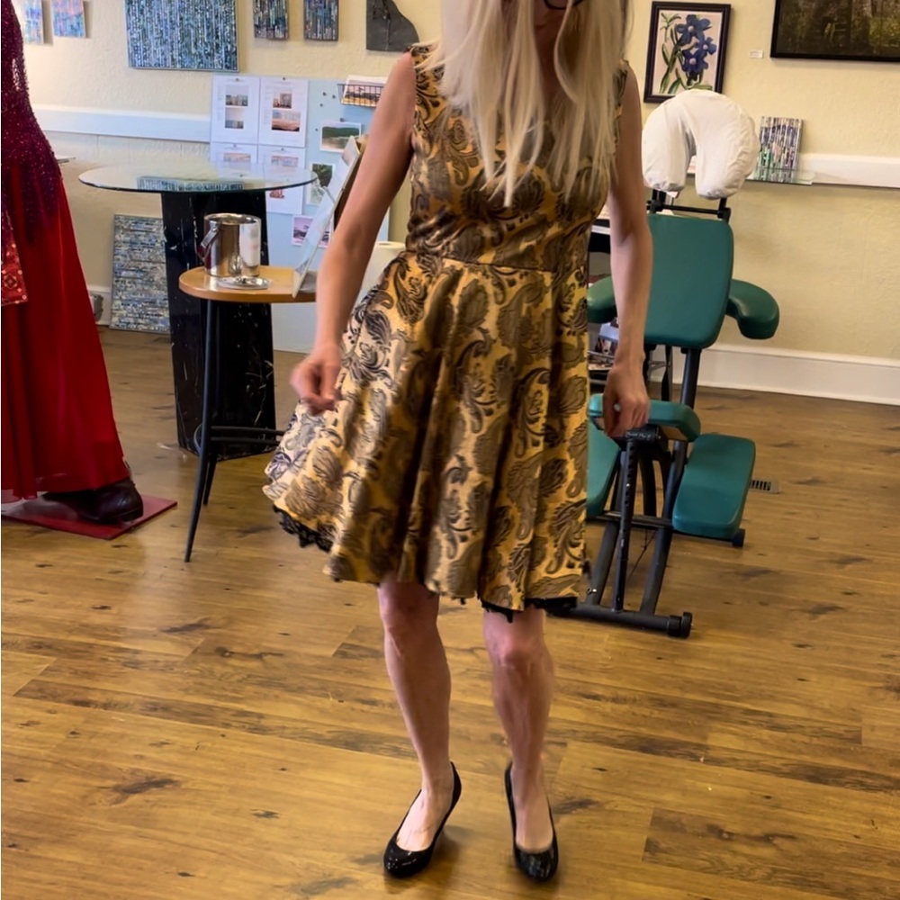 Elegant, Vintage, satan cocktail dress! It fits more like a Medium than a large.